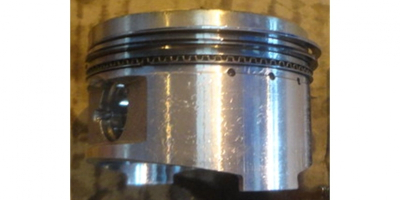 Поршень D57.5